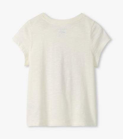 Cream short-sleeve girls T-shirt with a small starfish graphic on the back neckline, front view