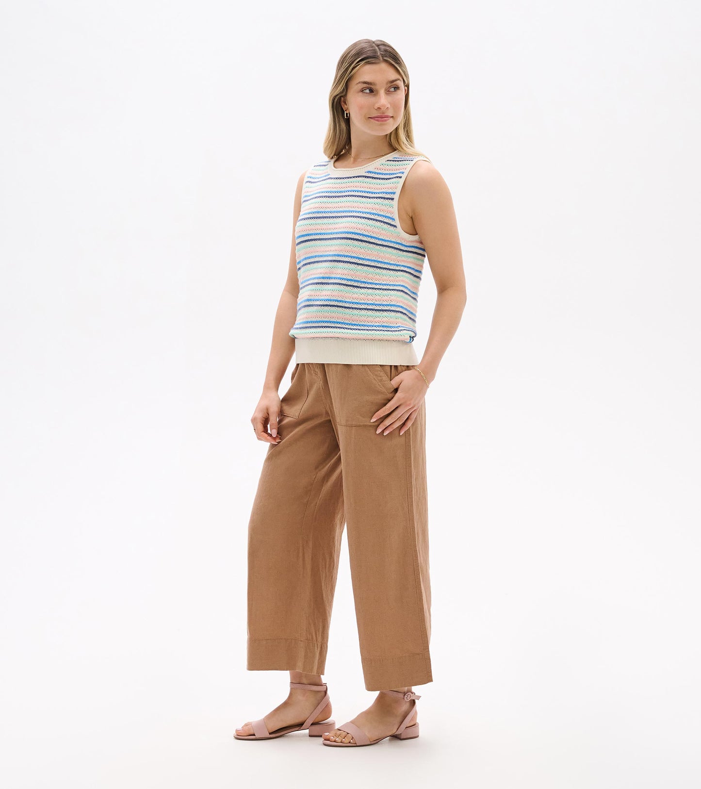 Front three-quarter view of sleeveless striped knit tank with ribbed hem