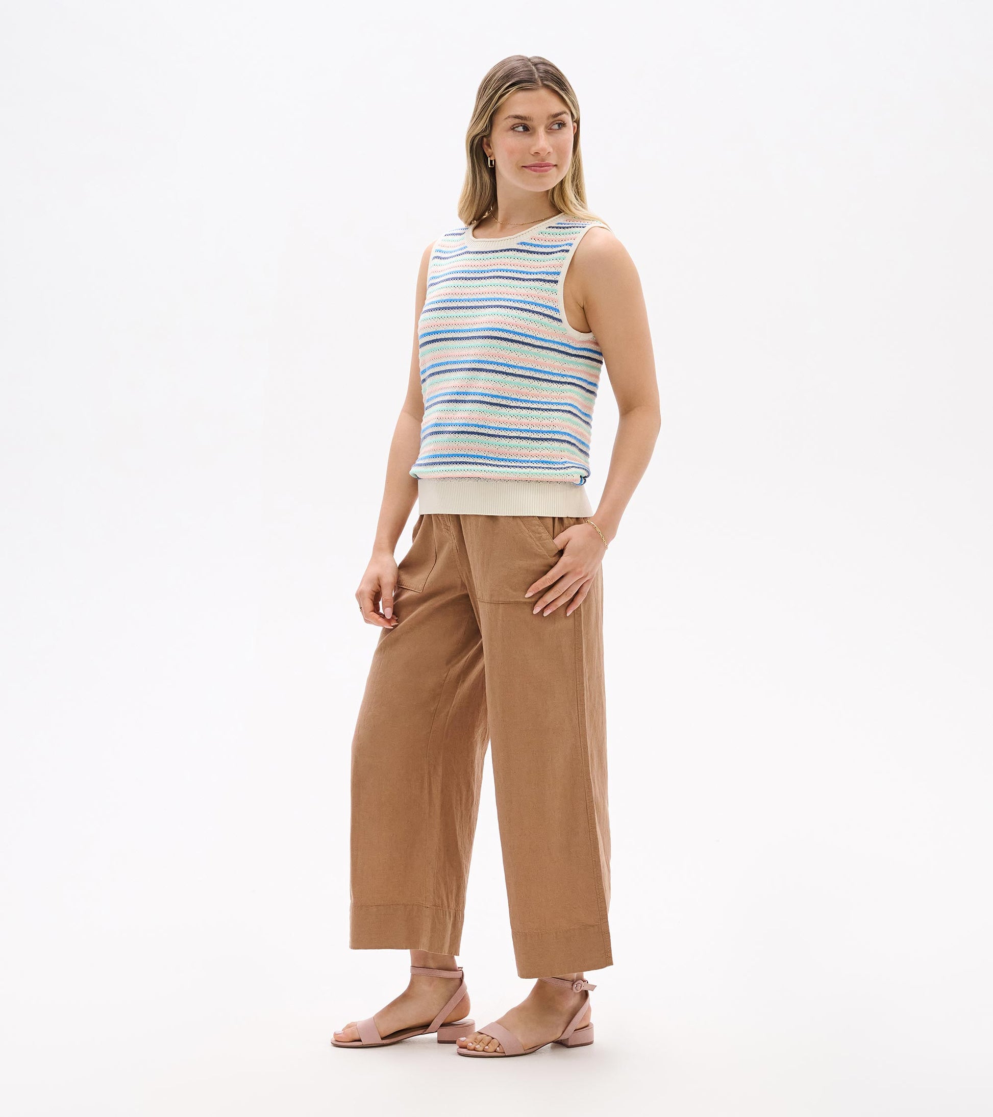 Front three-quarter view of sleeveless striped knit tank with ribbed hem