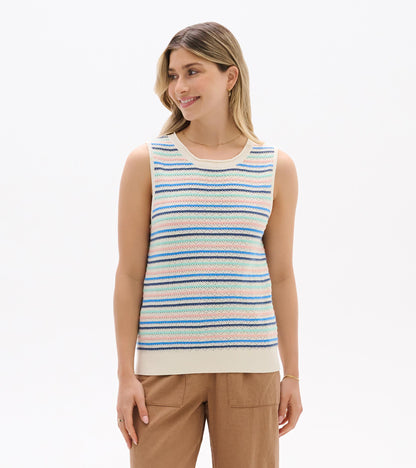 Sleeveless knit tank with cream base and blush, aqua, and blue stripes, shown from the front on a model