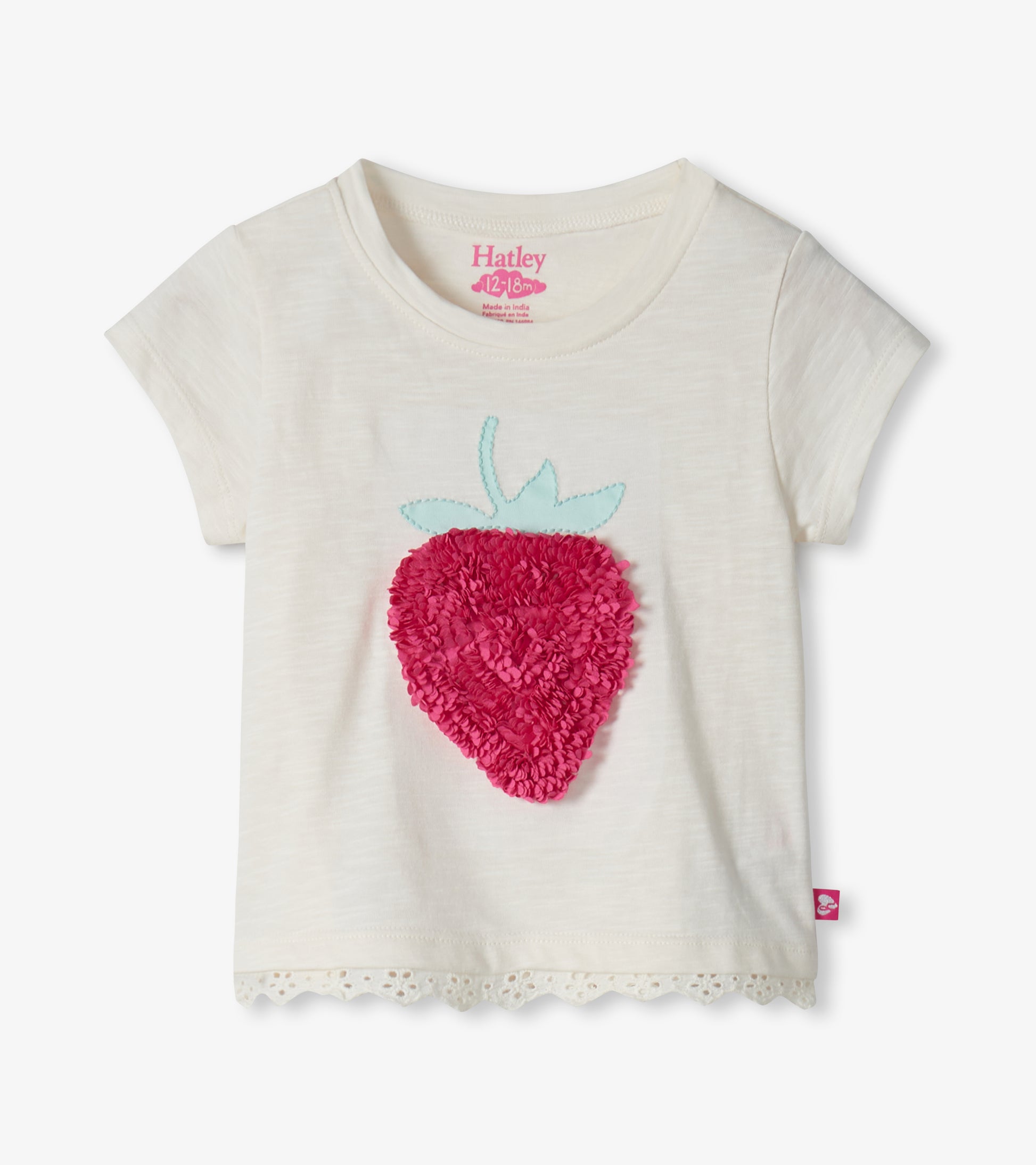 Cream short-sleeve toddler T-shirt with pink strawberry applique and lace hem, front view