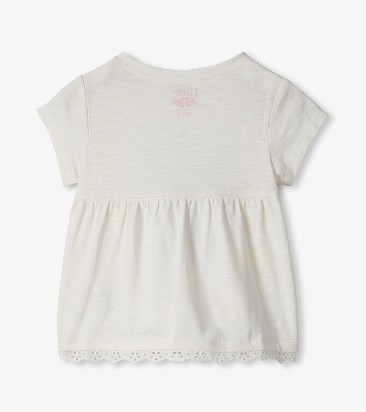 Cream short-sleeve toddler dress with gathered skirt and lace hem, front view