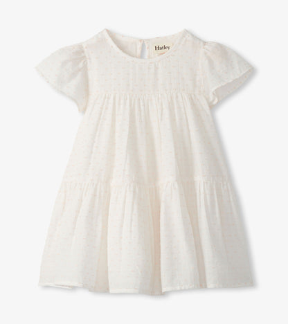 Pearl Swiss dot toddler dress with short flutter sleeves, round neck, and tiered skirt on white background