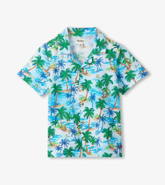 Light blue boys short-sleeve button-down shirt with tropical palm tree print, front view