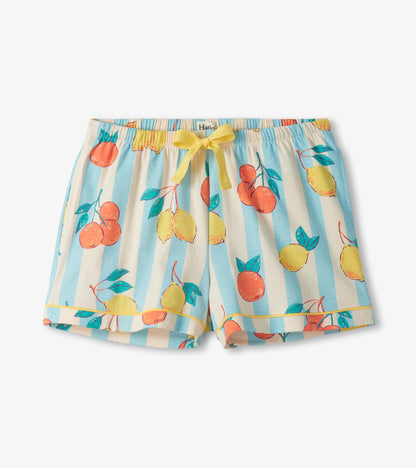 Women's pajama shorts with blue and cream stripes, citrus print, yellow drawstring, and ruffle hem