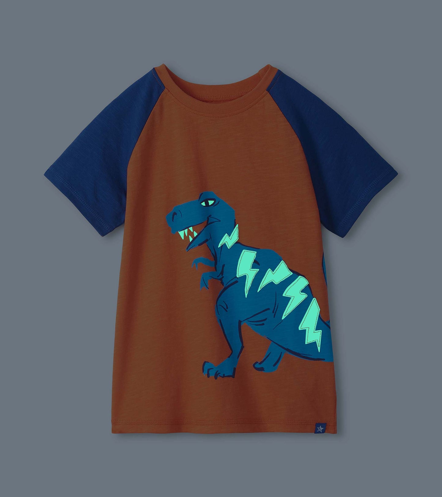Orange and navy raglan boys T-shirt with blue dinosaur and lightning graphic, front view