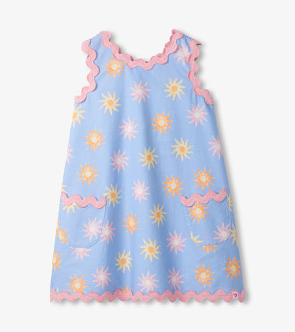 Blue Girls Faded Suns pinafore dress with pink rickrack trim, patch pockets, and scalloped hem