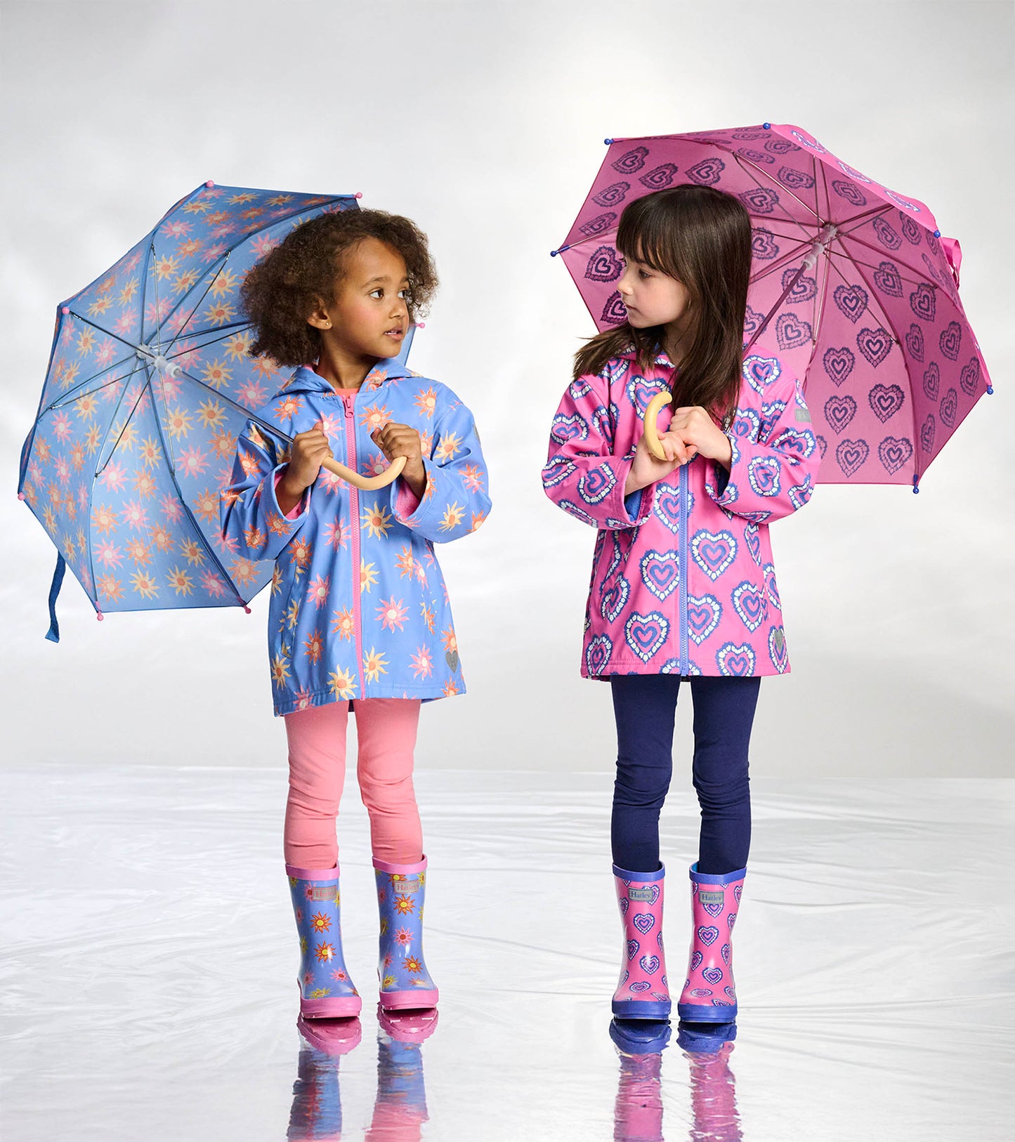 Veste de pluie à fermeture à glissière – Soleils décolorés