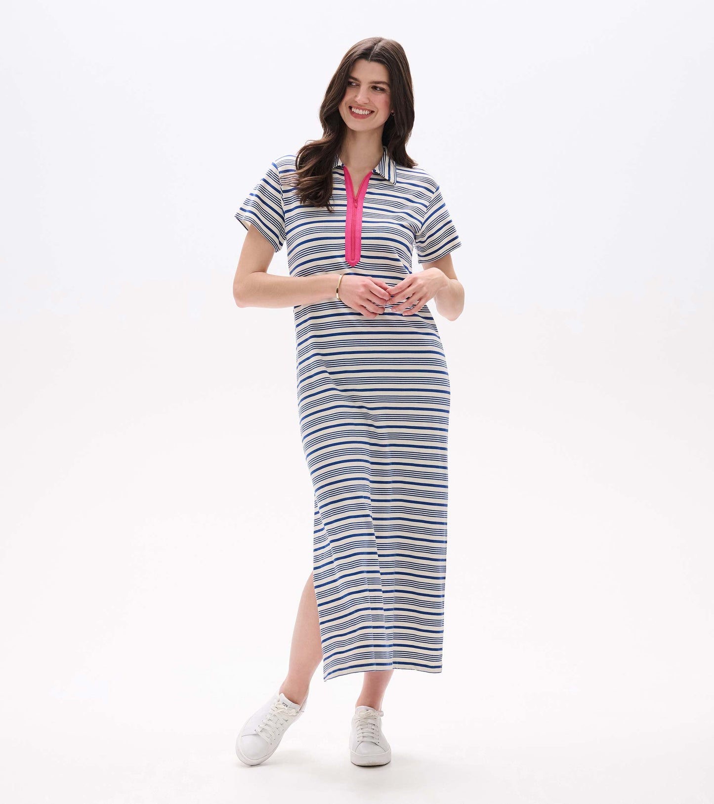 Women’s maxi dress with blue and white stripes, short sleeves, pink zip neckline, and side slit, front view