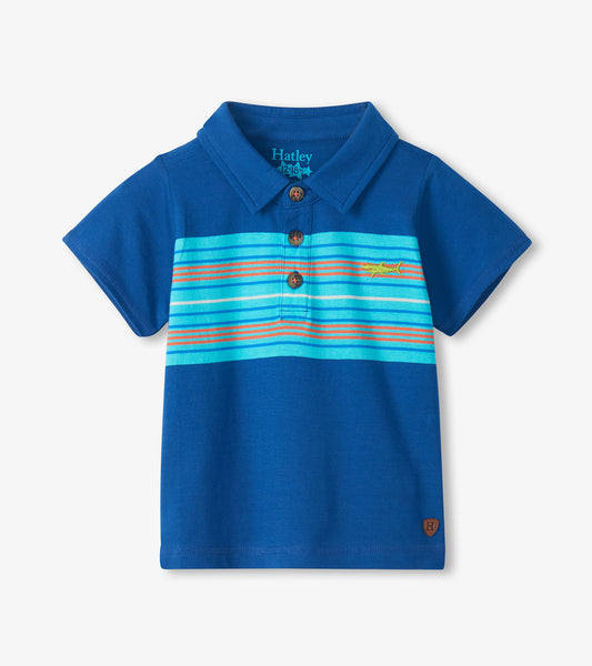 Blue short-sleeve boys polo shirt with striped chest panel, button placket, and small shark embroidery
