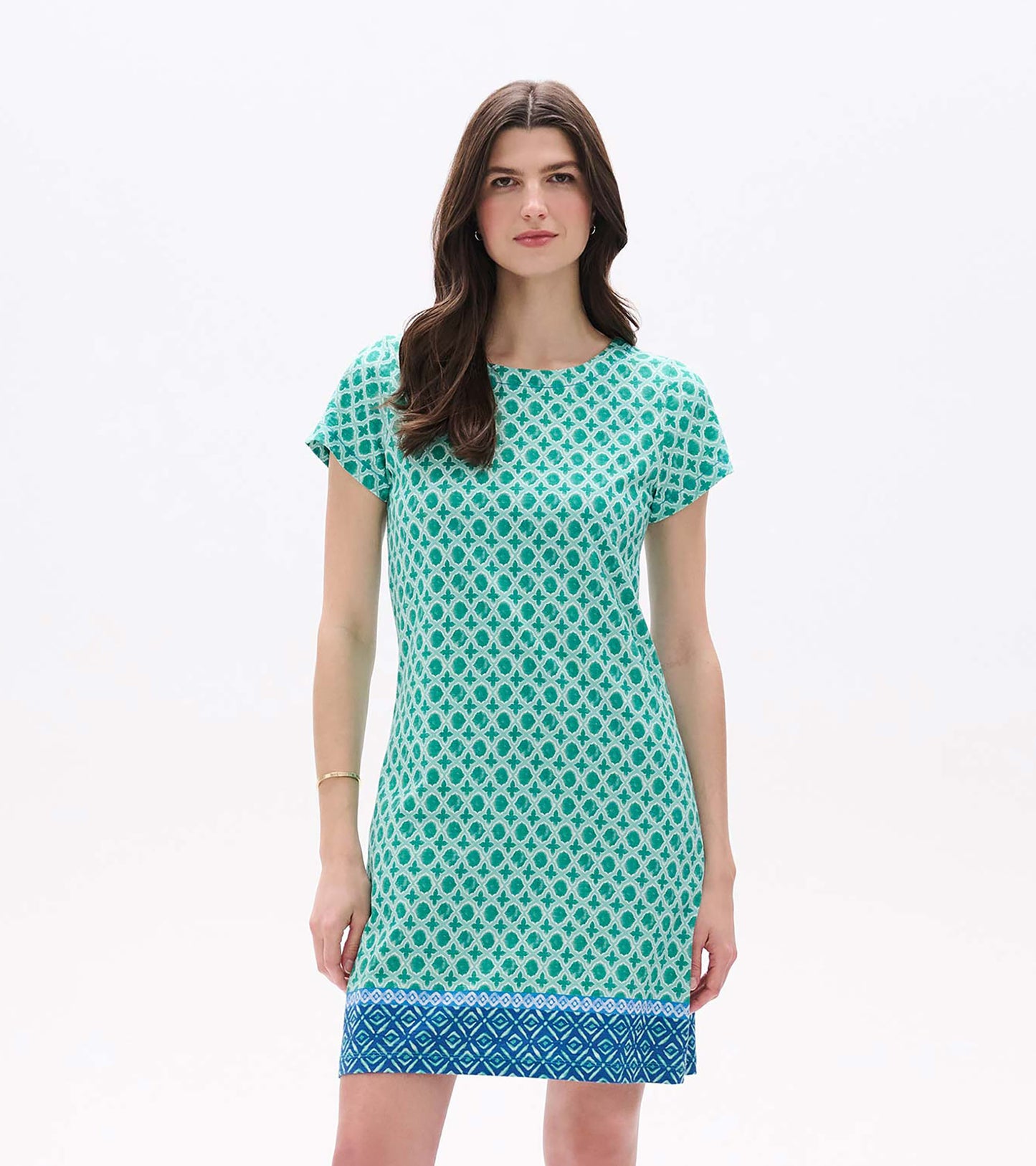 Front view of Arcadia Medallion tee dress in green and white with short sleeves and a blue border hem
