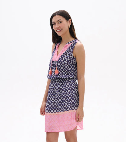 Sleeveless navy and pink patterned dress with tassel ties, front view