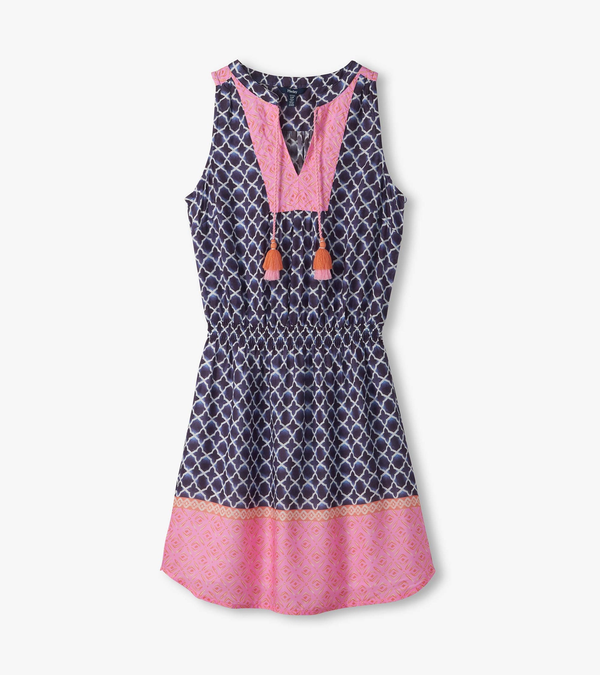 Sleeveless navy and pink patterned dress with V-neck, tassel ties, and gathered waist, front view