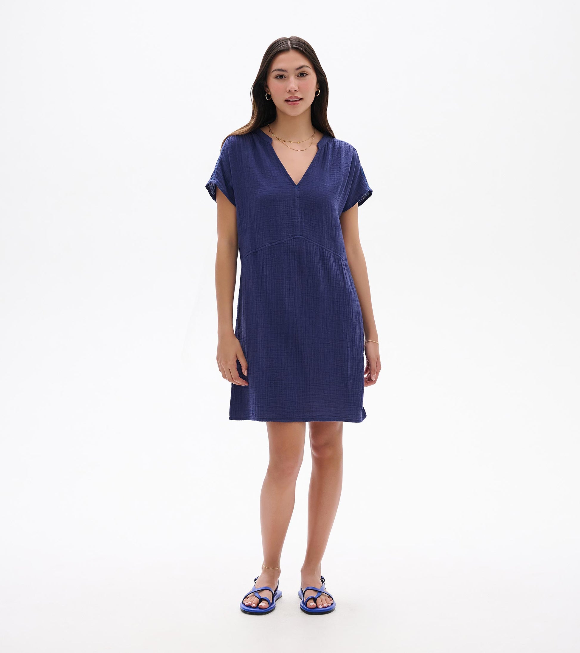 Front view of a navy blue short-sleeve V-neck knee-length dress with a relaxed fit and textured fabric.