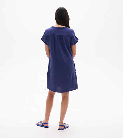 Back view of a navy blue short-sleeve knee-length dress with a loose fit and textured fabric