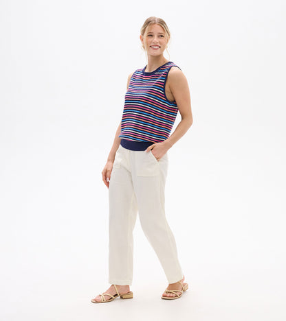 Sleeveless striped knit tank top in navy, pink, blue, and white, shown on a model.