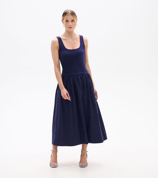 Sleeveless navy midi dress with scoop neckline, fitted bodice, and gathered flared skirt, front view