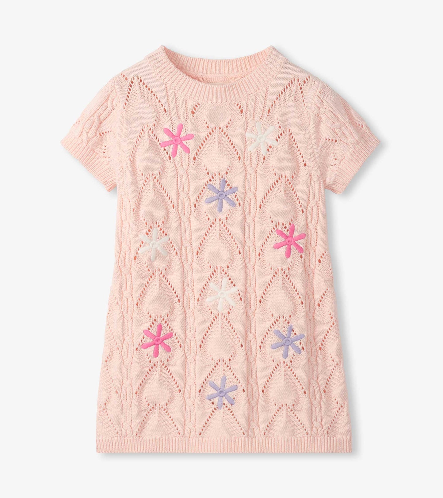 Light pink short-sleeve crochet dress with floral cutout pattern and multicolor flower appliqués, front view