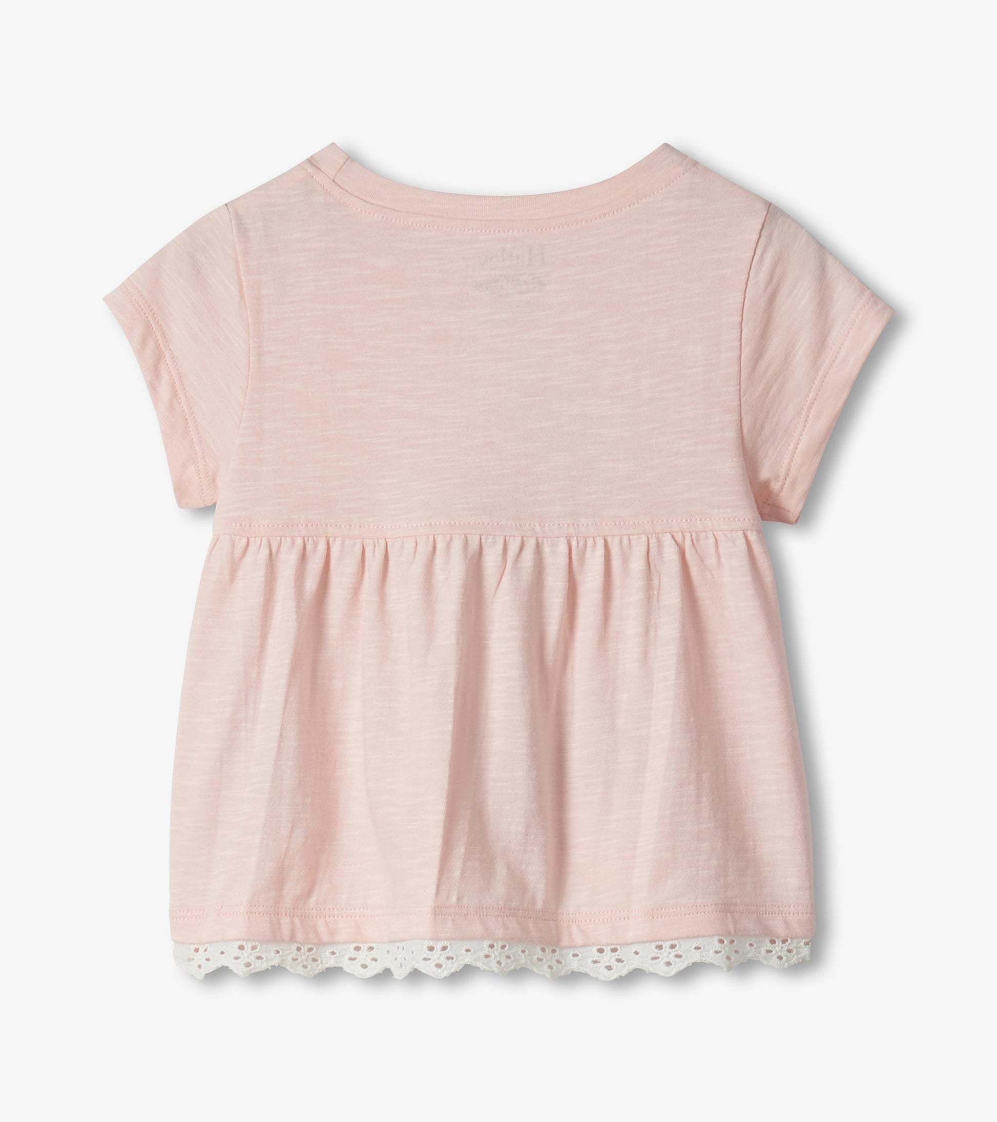 Light pink short-sleeve toddler top with gathered waist and lace hem, back view