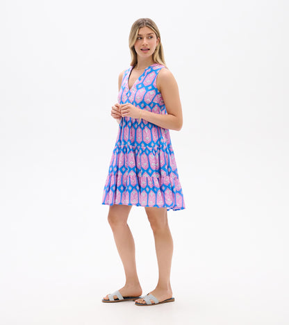 Sleeveless V-neck mini dress with blue, pink, and purple floral geometric print, tiered skirt, front view