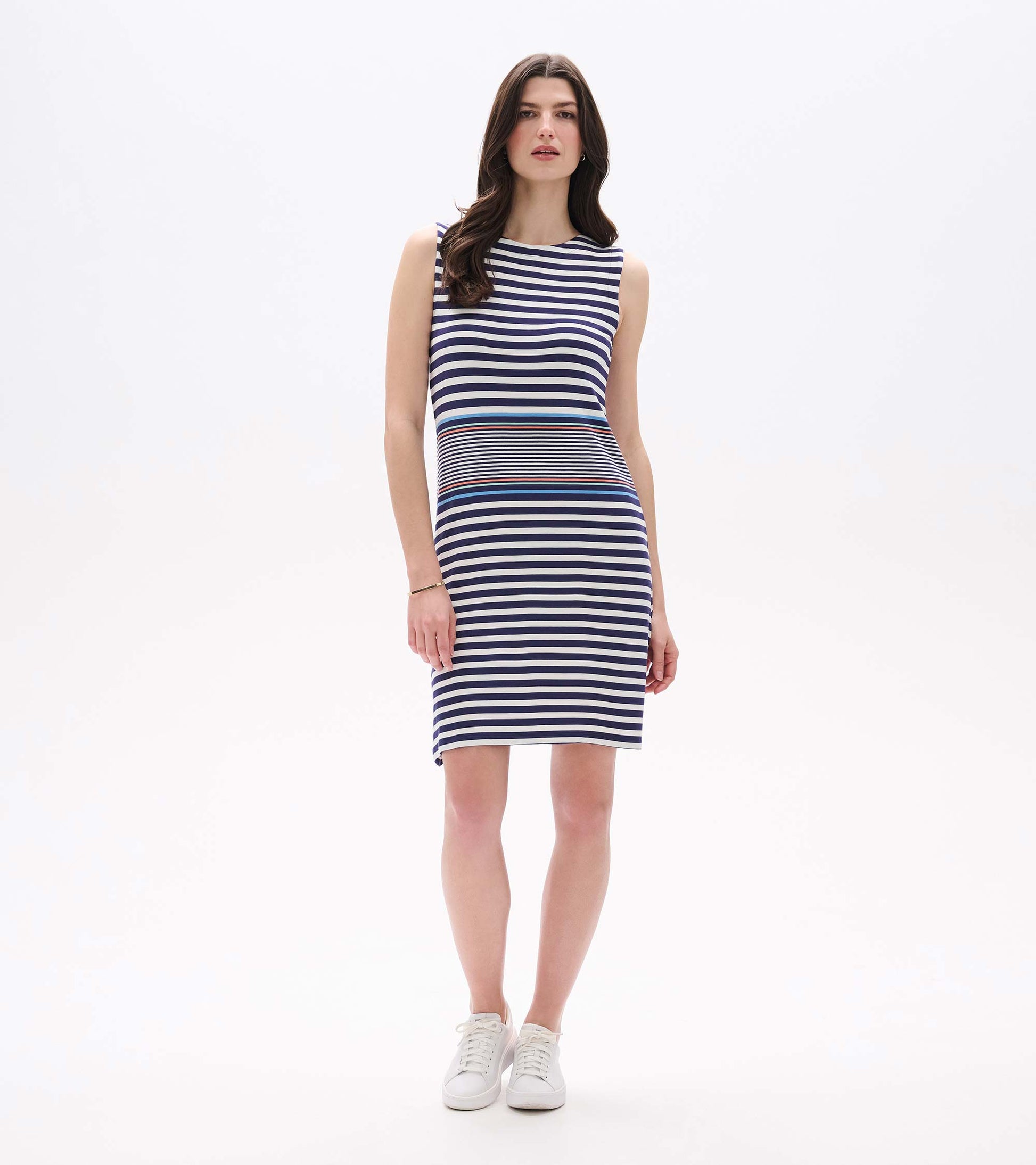 Sleeveless navy and white striped knee-length dress with fitted silhouette, shown front view on model