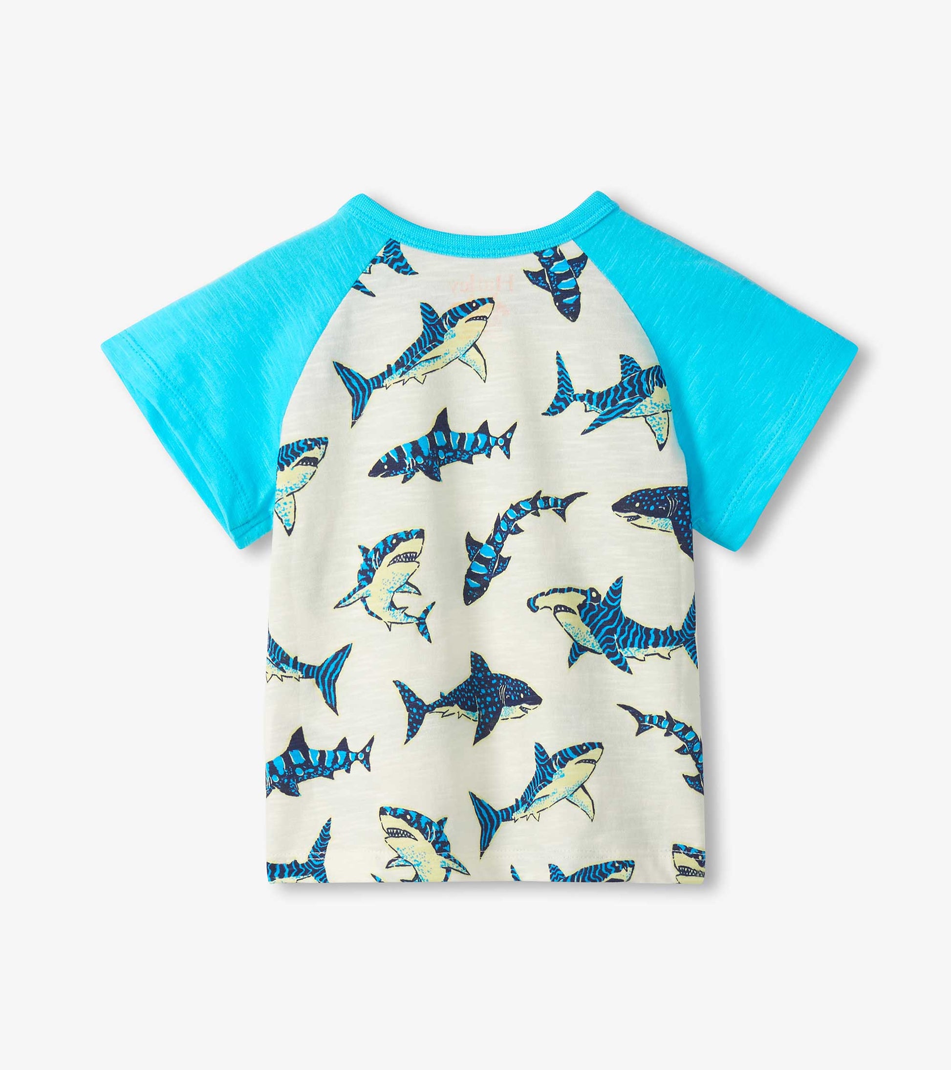 Front view of a boys raglan T-shirt with turquoise sleeves and cream body covered in blue shark print.