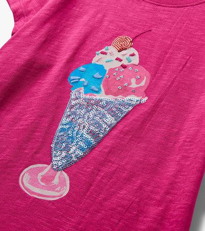 Pink girls graphic tee with sequined ice cream cone design, close-up front view