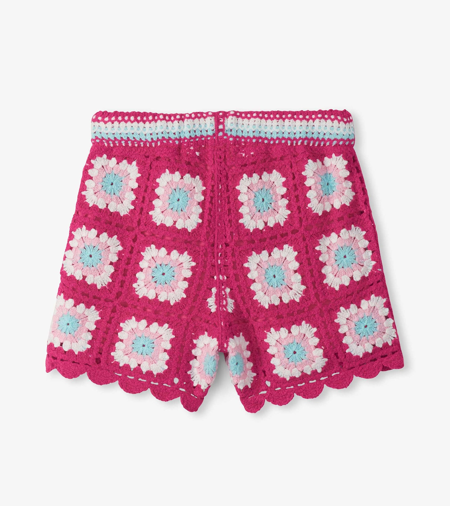 Girls pink crochet shorts with floral pattern and scalloped hem, front view