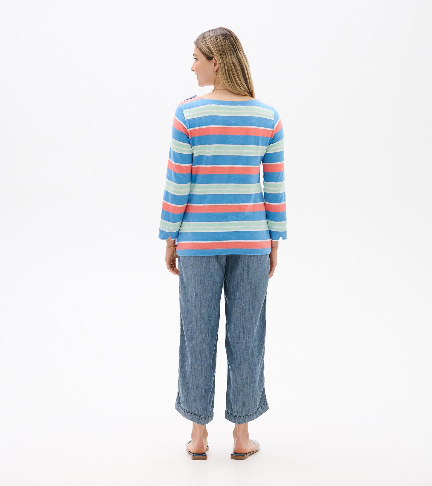 Back view of a blue striped long-sleeve top with coral and mint horizontal stripes