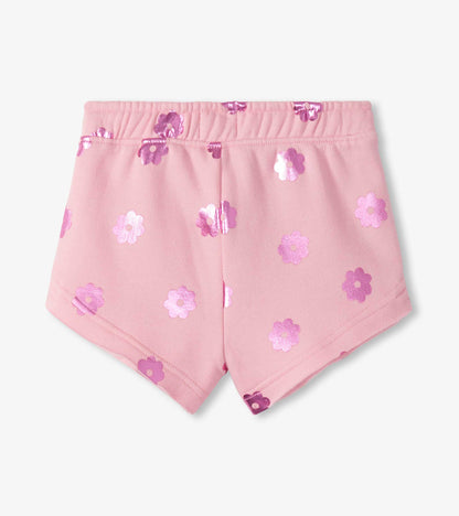 Pink pull-on shorts with purple and pink floral print, front view