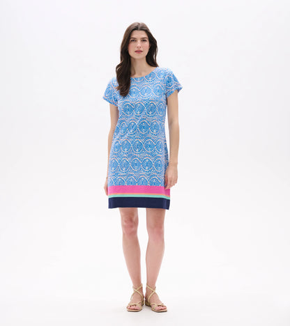 Front view of blue and white ikat tee dress above the knee with short sleeves and striped hem