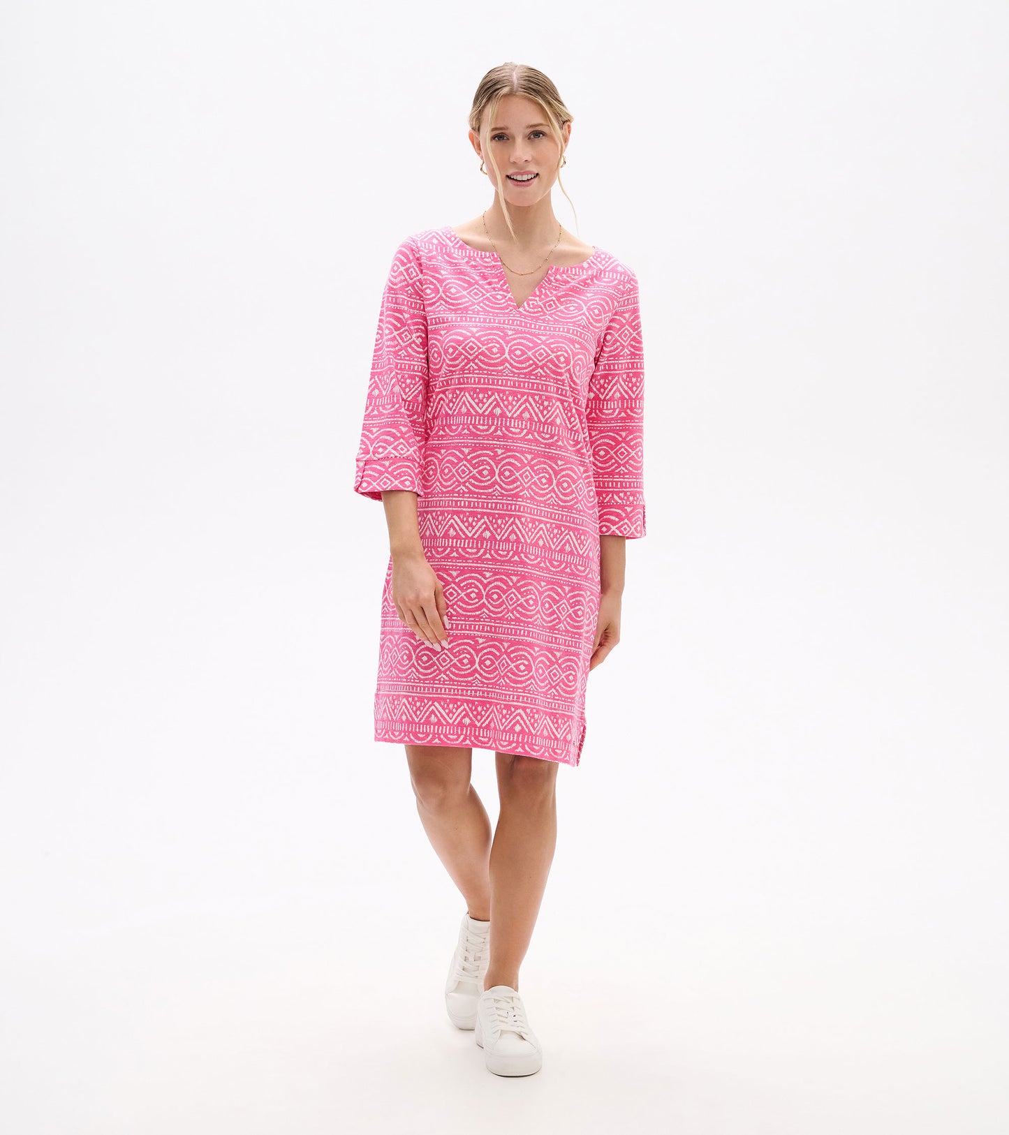 Pink patterned knee-length dress with notch neck and 3/4 sleeves, shown on model front view