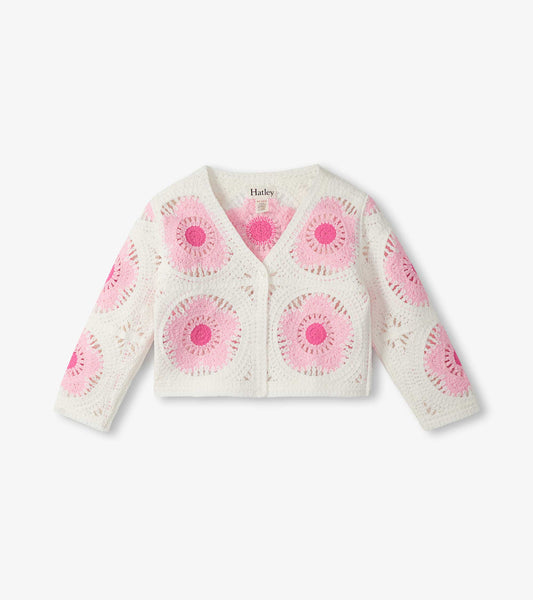 Cream crochet cardigan with pink circular flower pattern, long sleeves, and front button closure, front view