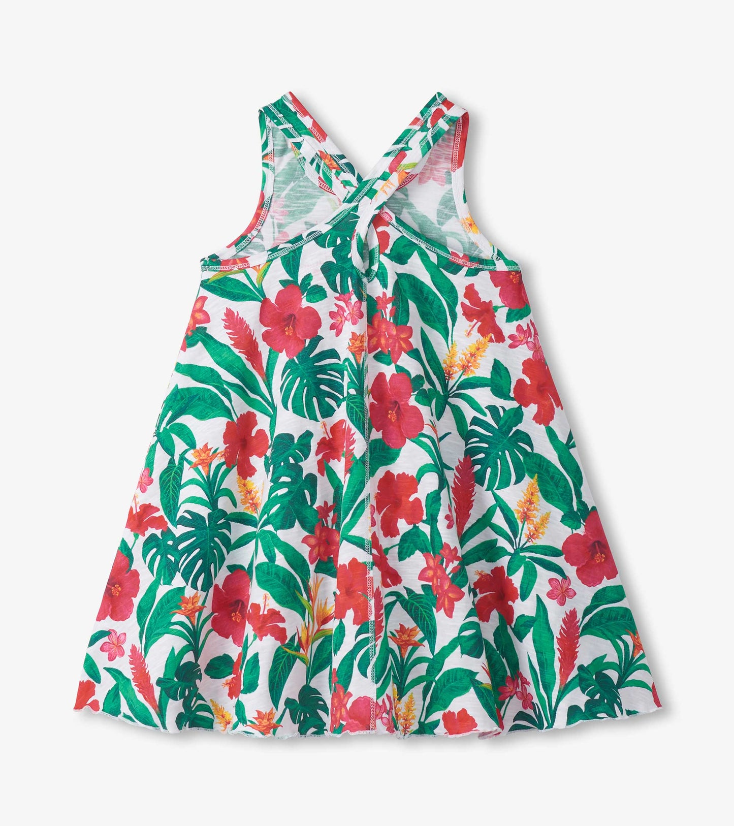 Girls white trapeze dress with tropical floral print and crisscross back straps