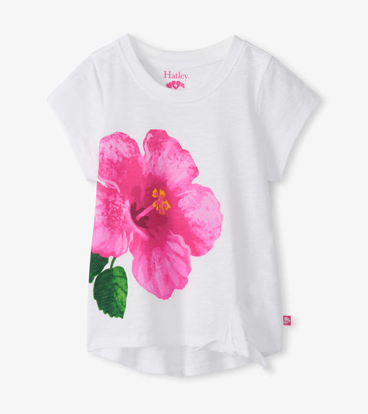 White girls T-shirt with large pink hibiscus flower print and short sleeves, front view