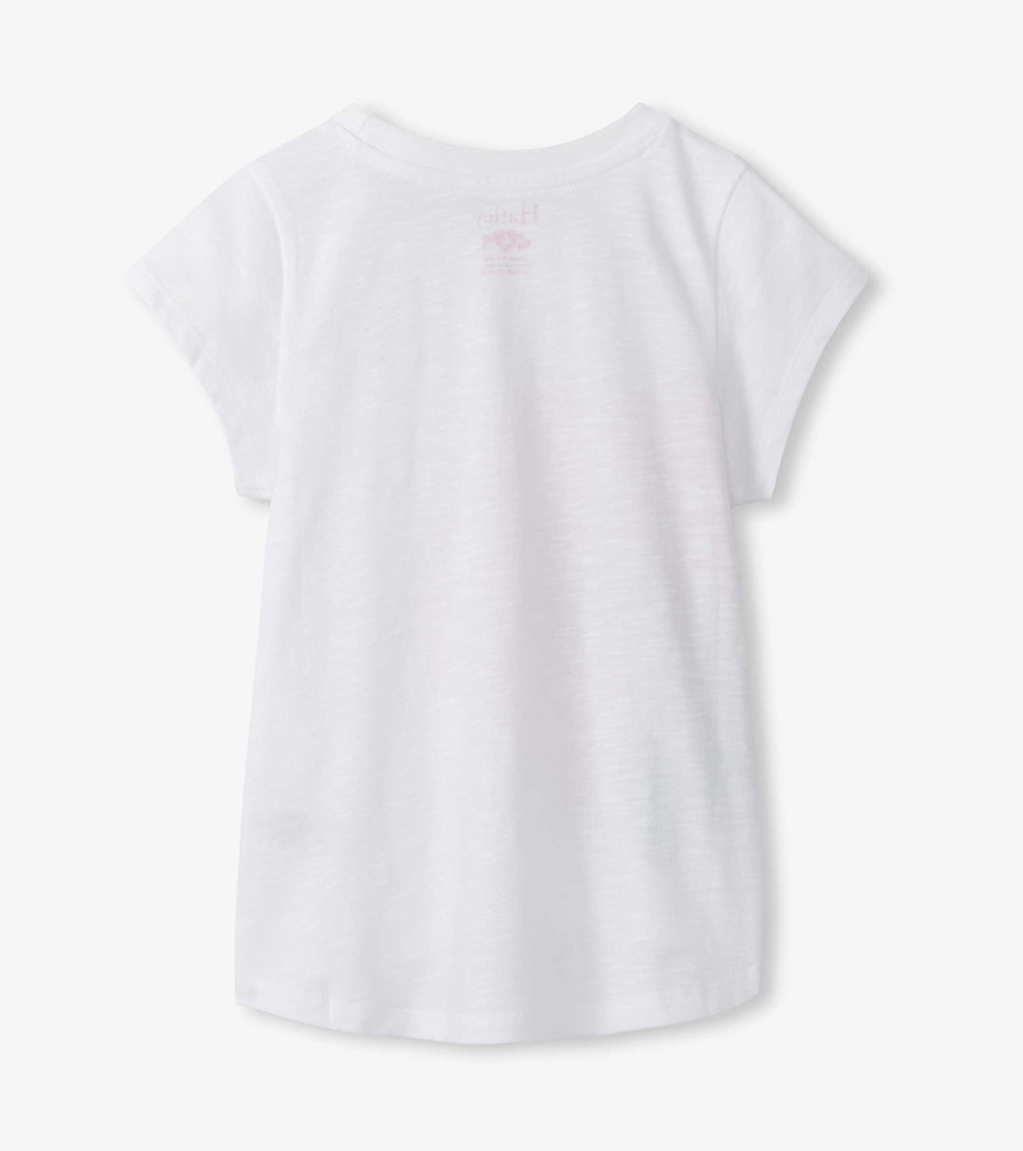 White girls short-sleeve T-shirt with round neck and small pink hibiscus graphic on back, front view