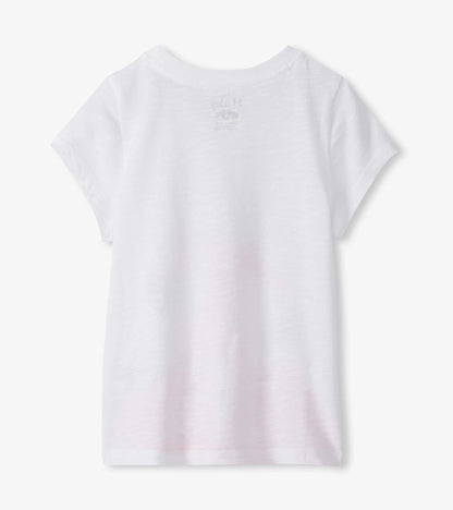 White girls graphic tee, back view, short sleeves, flamingo print faintly visible on back neck area