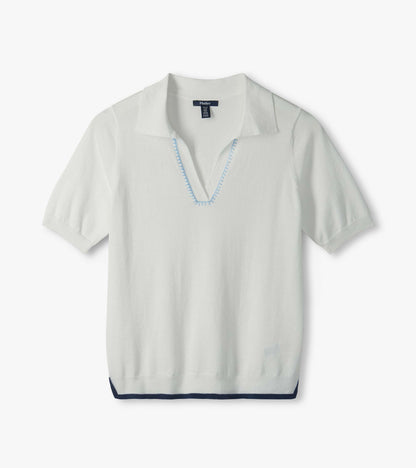 White short-sleeve collared top with V-neck and light blue trim, front view