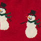 Two snowmen on a red background, one wearing a red Santa hat and one wearing a black top hat