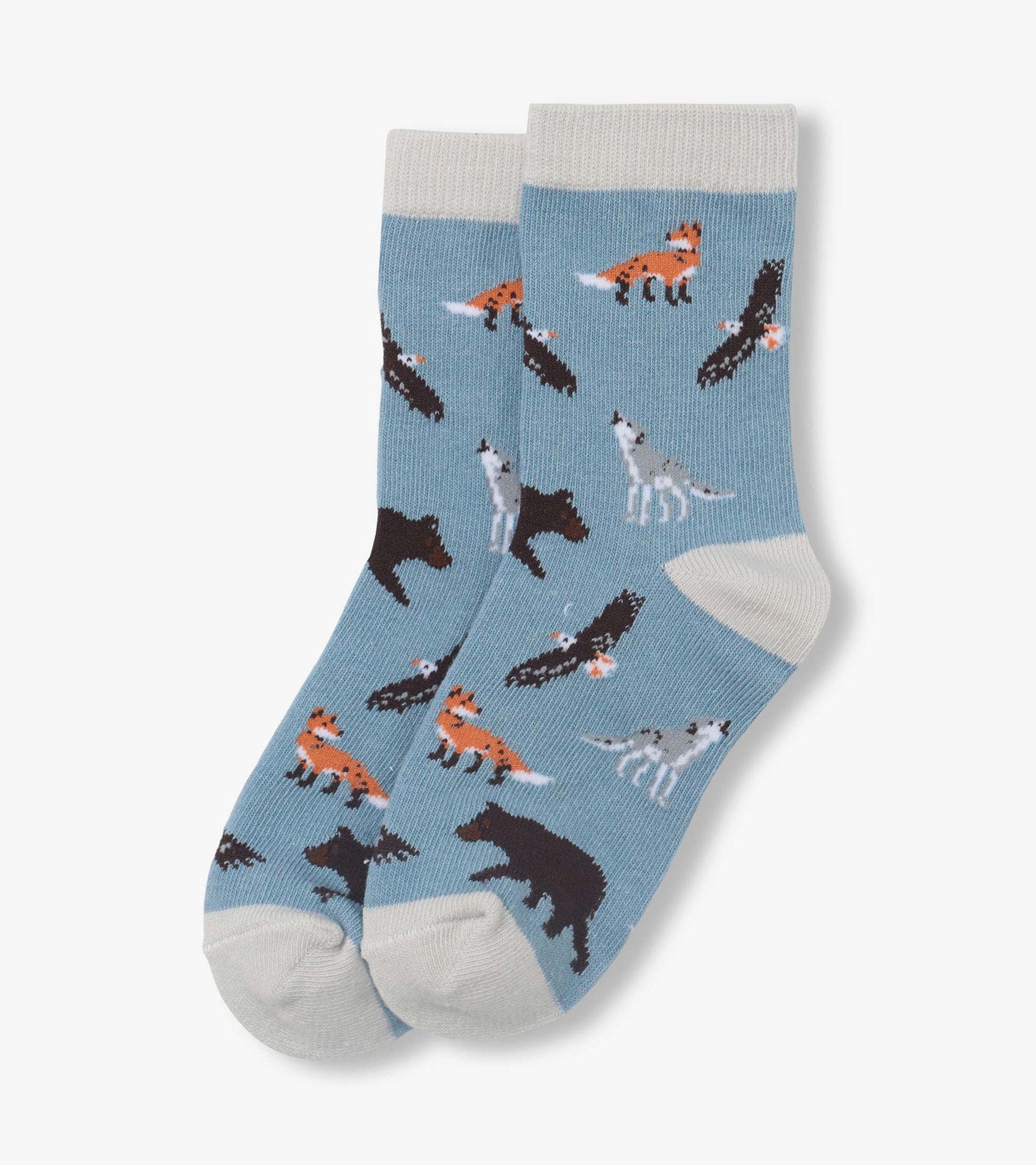Light blue crew socks with white cuffs and toes, featuring scattered fox and bear patterns.