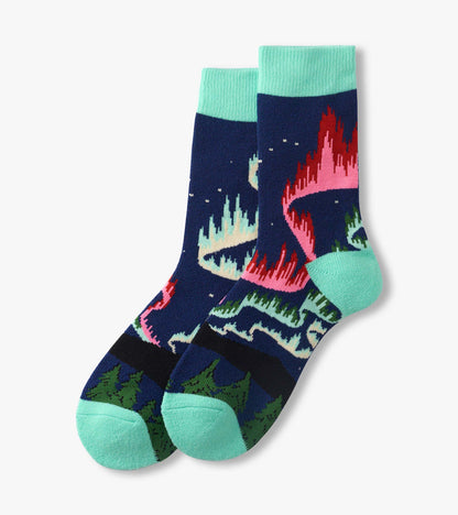 Pair of navy crew socks with mint cuffs and toes, featuring colorful northern lights pattern