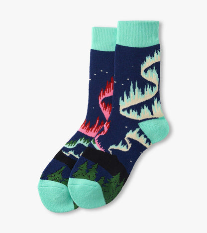 Pair of navy crew socks with mint cuffs, heels and toes, featuring colorful aurora borealis pattern