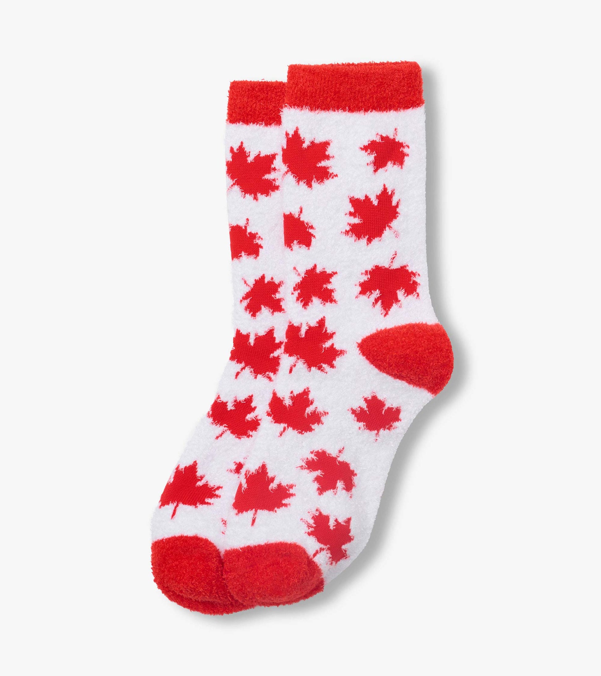 White fuzzy socks with red maple leaf pattern, red cuffs, heel and toe, shown flat on white background