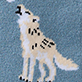 View Adult Northern Wilderness Cozy Socks - White wolf silhouette with black spots on a blue textured background