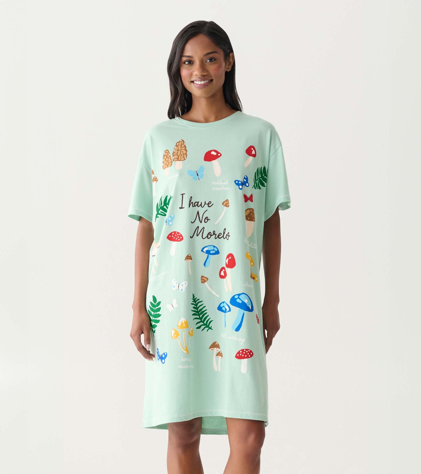 Mint green short-sleeve sleepshirt with mushroom and butterfly print and “I have No Morels” text, front view