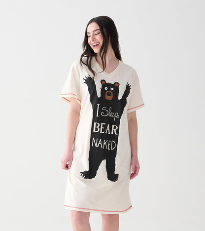 Women's cream sleepshirt with short sleeves, pink trim, and large black bear graphic with slogan on front