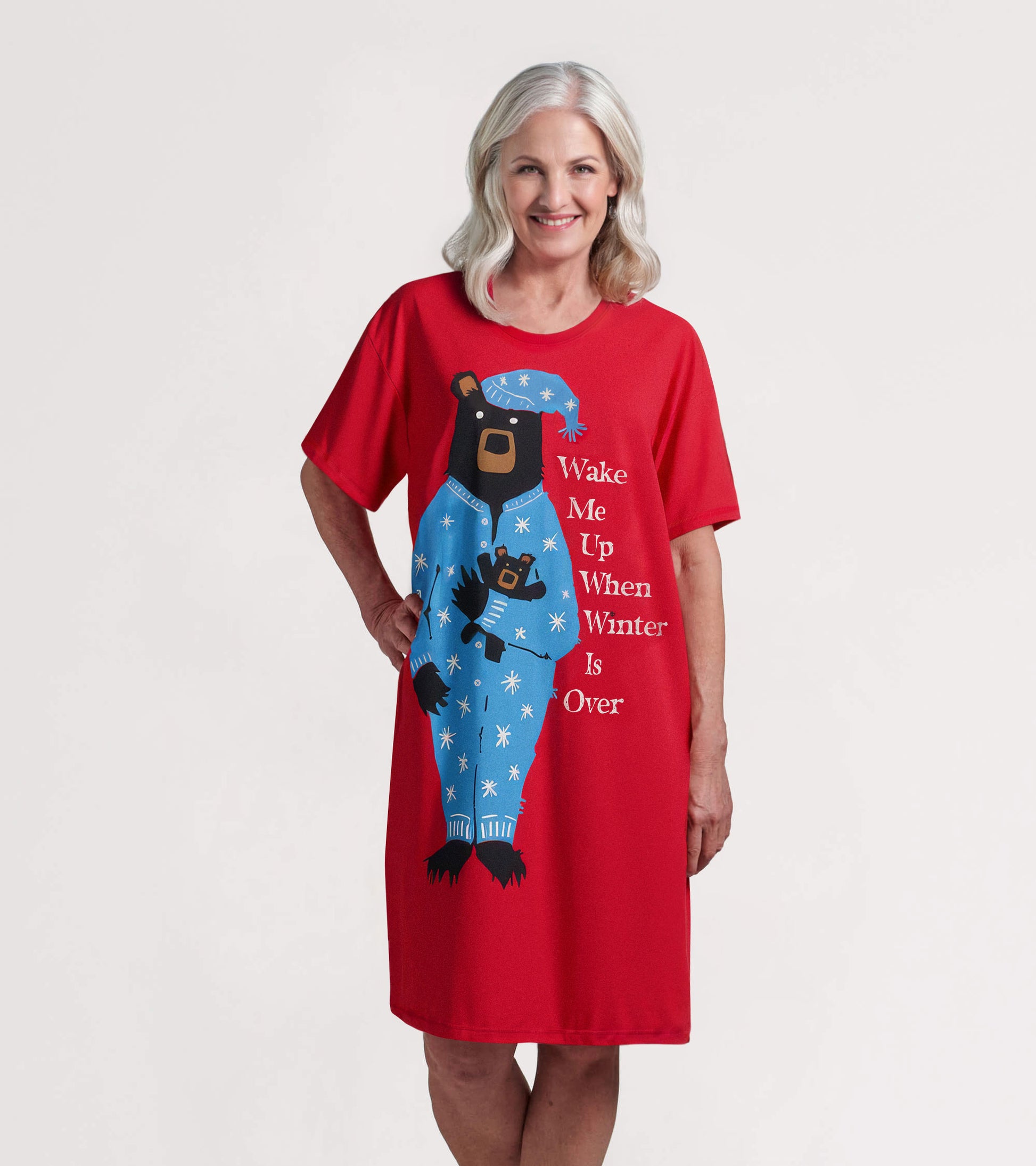 Red sleepshirt featuring a bear graphic in blue pajamas with text, short sleeves, and a relaxed fit.