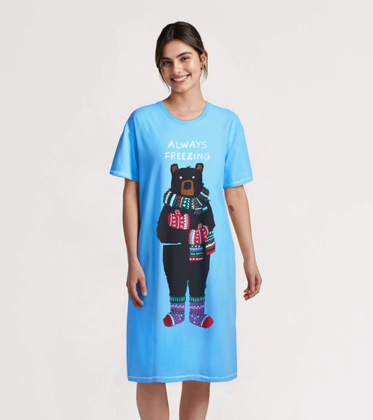 Light blue sleepshirt featuring a bear graphic wearing colorful winter accessories, short sleeves, and a relaxed fit.