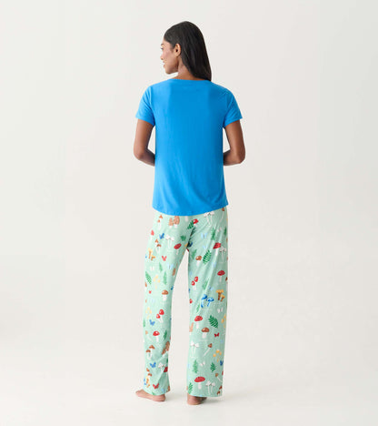 Back view of a blue V-neck T-shirt with short sleeves, paired with mint mushroom-print pajama pants