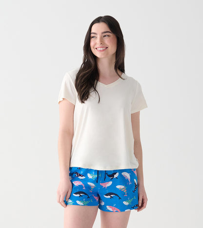 Women's cream V-neck T-shirt shown from the front on a model